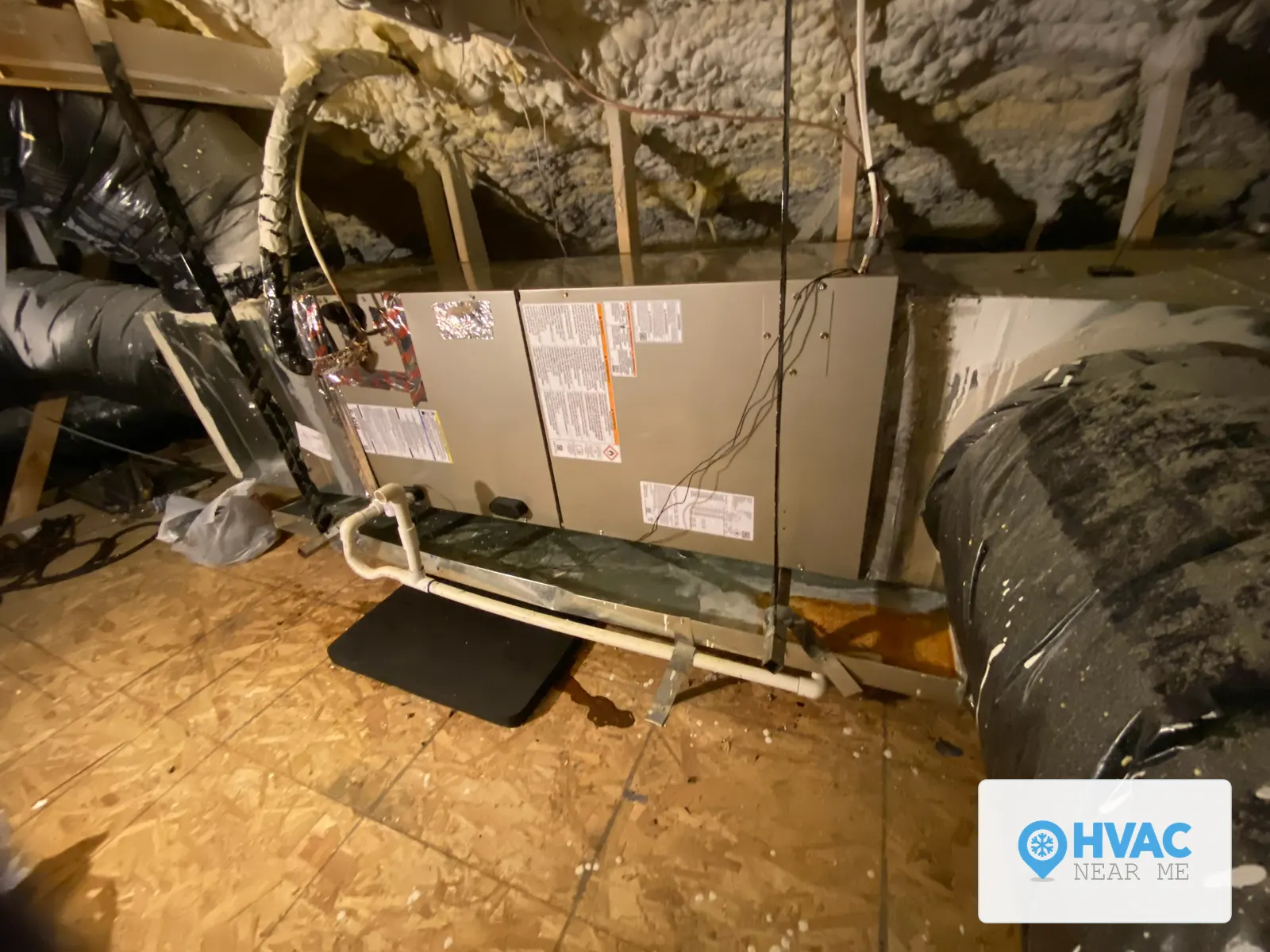 Real furnace and air handler unit installed in a residential attic by HVAC Near Me