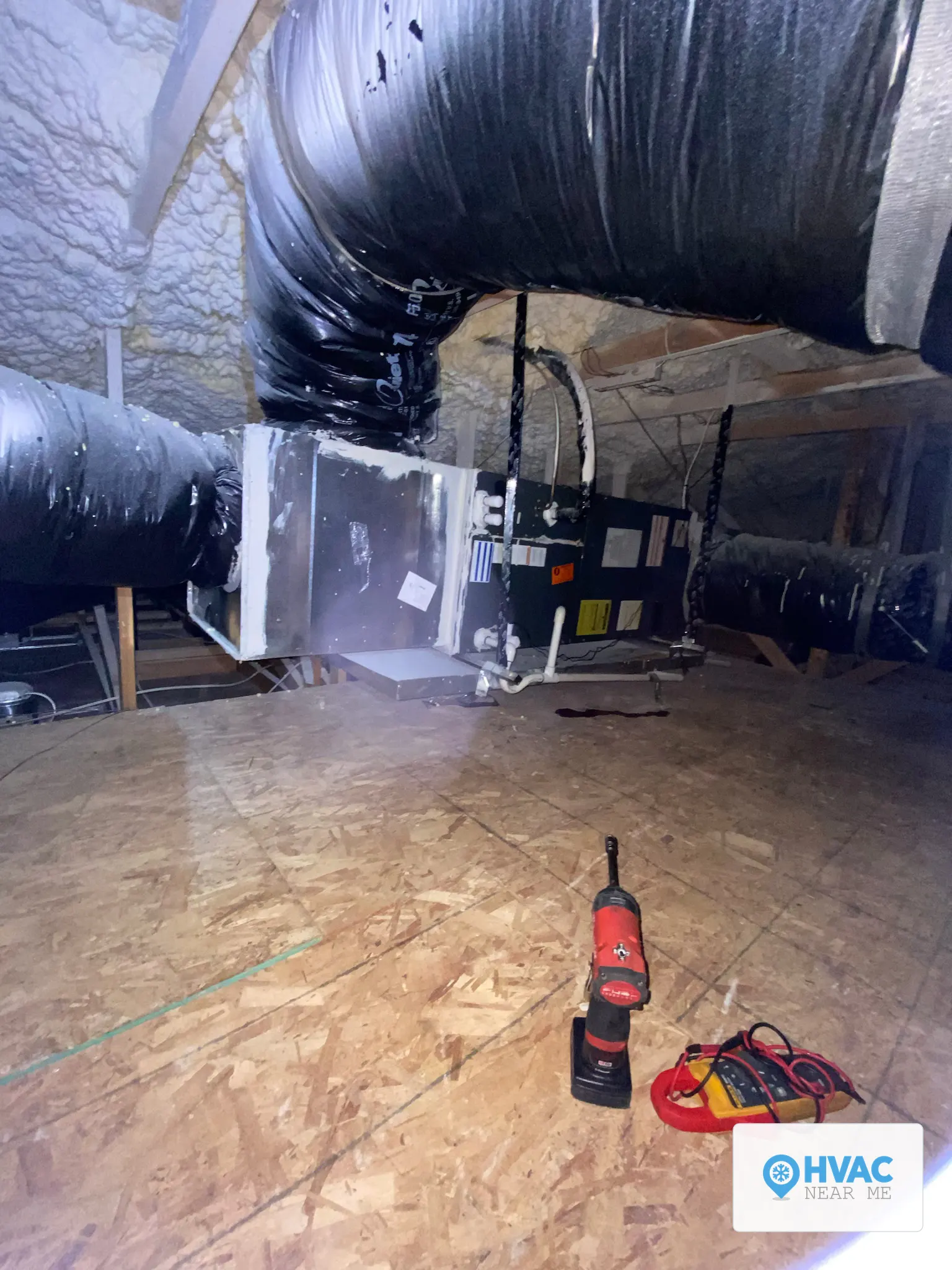 Real HVAC Near Me technician's diagnostic tools during an attic system inspection